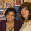 Тамара Никифорова у стенда о домовладельцах