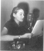 At a microphone Ludmila Obolensky
